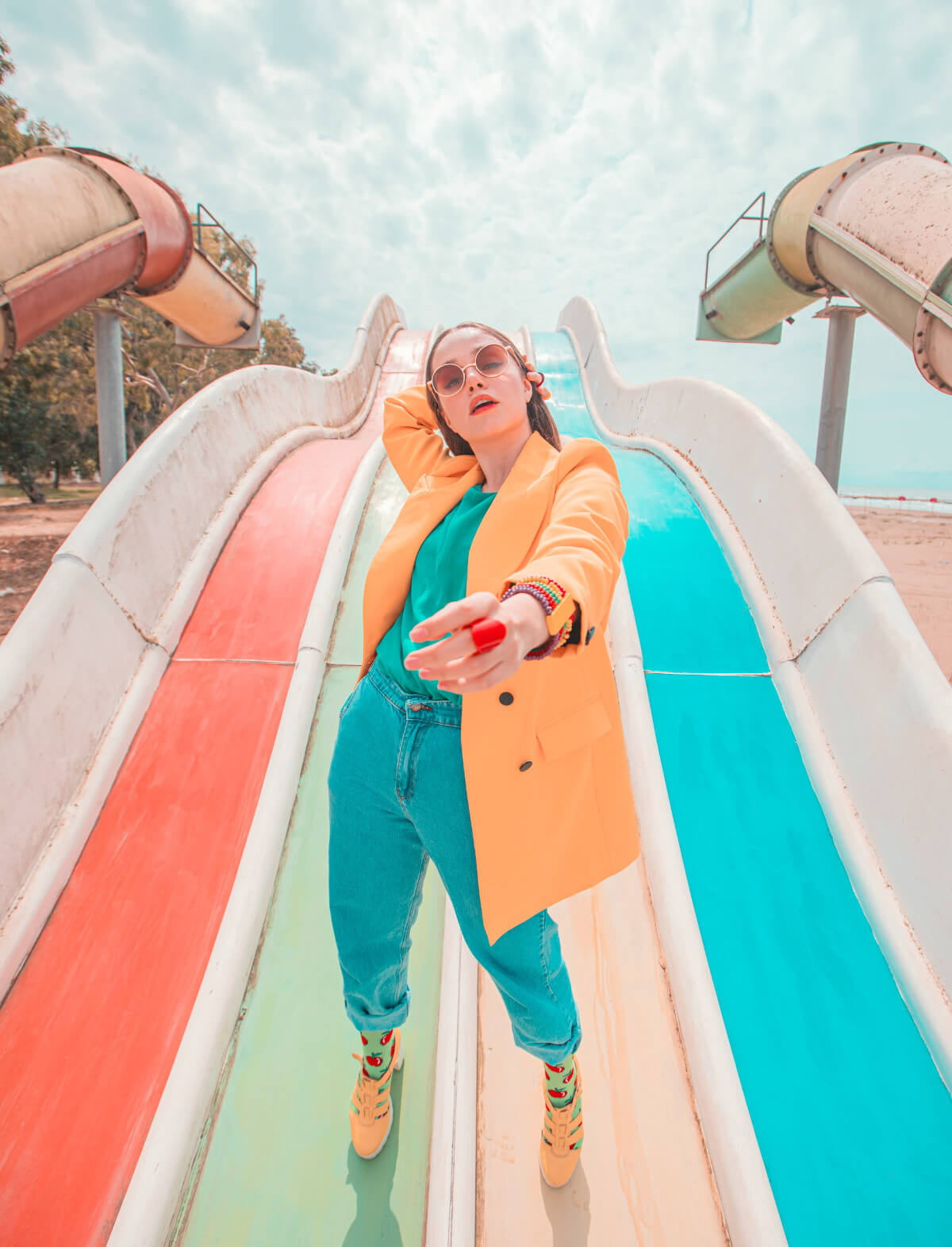 5. A fashionable woman poses in an abandoned water park!